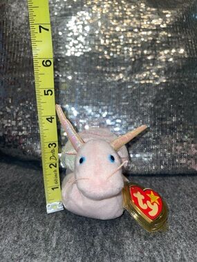 A rare SwirlyTy Beanie Baby Pink Narwhal Plush - Iridescent Horns